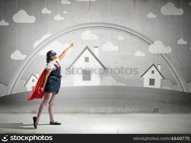 Super kid. Girl of school age in super hero costume