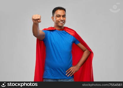 super power and people concept - indian man in red superhero cape making winning gesture over grey background. indian man in superhero cape makes winning gesture