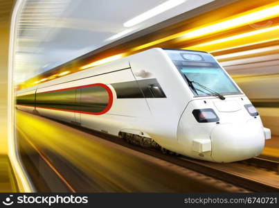 super streamlined train with motion blur moves in tunnel