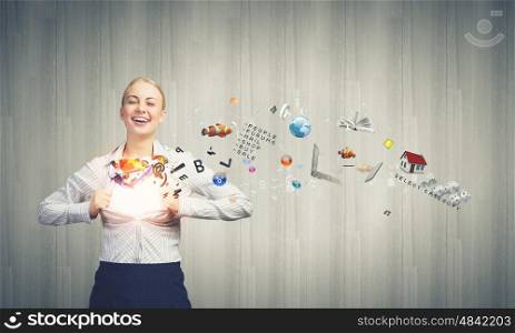 Super woman. Young woman tearing shirt on chest and icons flying out