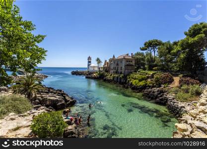Superb view of the inlet along the rocky coastline near the Santa Marta Lighthouse in Cascais, Portugal