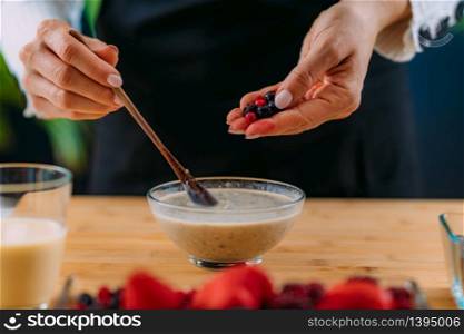 Superfoods - Making oatmeal with Oats, Soy Milk and Berries