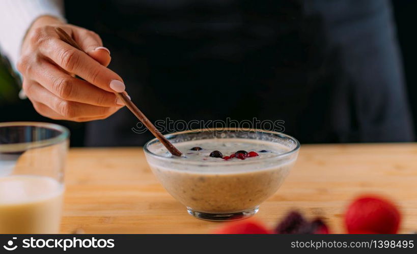 Superfoods - Making oatmeal with Oats, Soy Milk and Berries