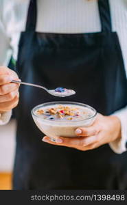 Superfoods - Making oatmeal with Oats, Soy Milk and Berries