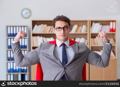 Superhero businessman working in the office