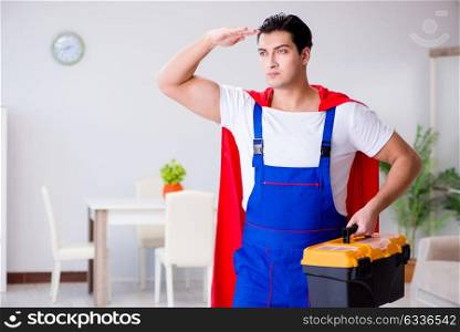 Superhero repairman with tools in repair concept
