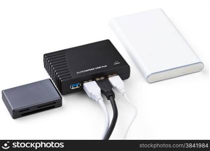 superspeed usb hub, hard disk and card-reader isolated on a white background