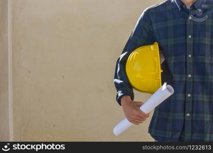 Supervisor holding helmet blueprint architect construction concept, Foreman hold hardhat equipment work contractor