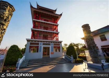 Suphanburi, Thailand, October 23, 2019: Chinese viewpoint building to see aerial view of Suphanburi at City Pillar Shrine during sunset of Suphanburi Province.