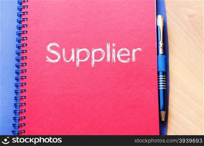 Supplier text concept write on notebook with pen