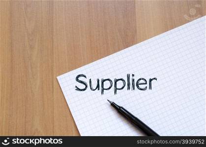 Supplier text concept write on notebook with pen