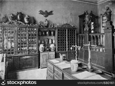 Supply room of an old pharmacy at the Germanic National Museum of Nuremberg, vintage engraved illustration. From the Universe and Humanity, 1910.