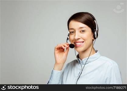 Support phone call center operator with headset