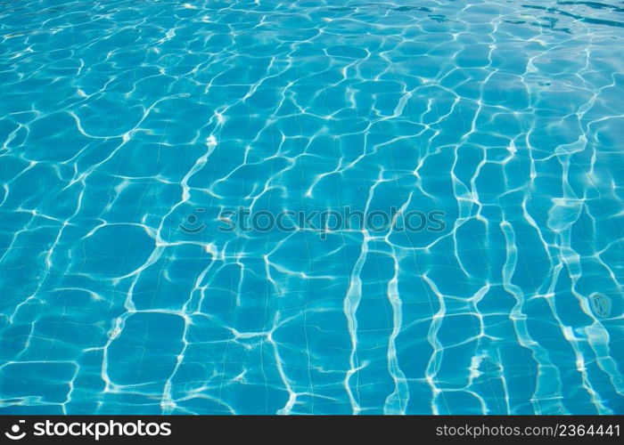 surface of blue swimming pool,background of water in swimming pool.