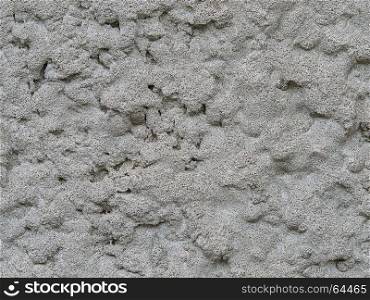 Surface of the wall . Surface of the wall plastered manually (closeup)