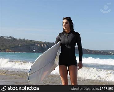 Surfer enjoying beach, Roadknight, Victoria, Australia