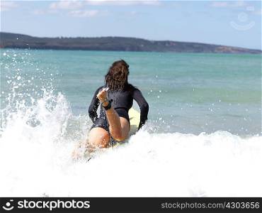 Surfer in sea, Roadknight, Victoria, Australia