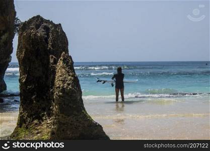 surfer on beautiful beach view summer holiday photo. surfer on beautiful beach view summer holiday
