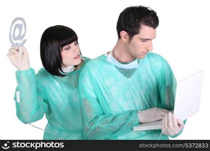 Surgeon and assistant