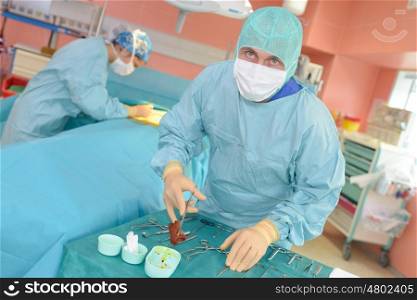 surgeon practicing an operation at an operating theater