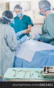 Surgeons performing operation