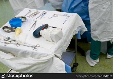 surgical instruments on a table in a real operating room