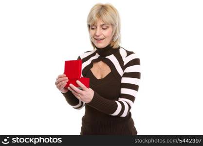 Surprise middle age woman opening present box