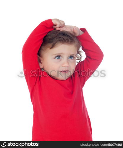 Surprised baby with his hands on the head isolated on a white background