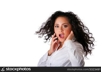 Surprised beautiful Caucasian Hispanic Latina young business woman with brown curley hair. Cute tanned brunette, ethnic girl in white shirt and twirling hair and open mouth, isolated.
