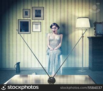 Surprised beautiful girl in the vintage interior,watching tv. Creative concept