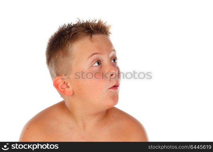 Surprised blond child looking up isolated on a white background