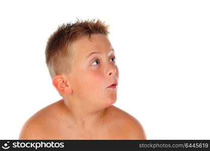 Surprised blond child looking up isolated on a white background
