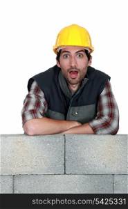 Surprised bricklayer