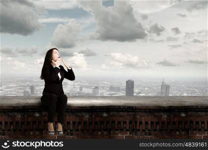 Surprised businesswoman. Young emotional businesswoman covering mouth with palm