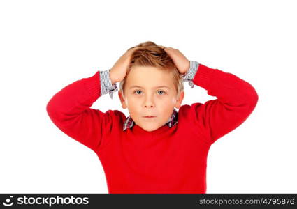 Surprised child with red jersey and his hands on the head isolated on white background