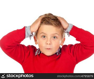 Surprised child with red jersey and his hands on the head isolated on white background