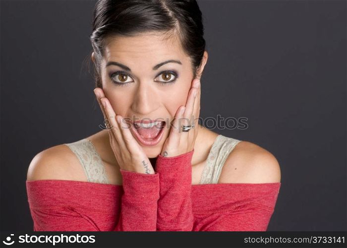 Surprised Excited Brunette Woman Looks at Camera Red Sweater