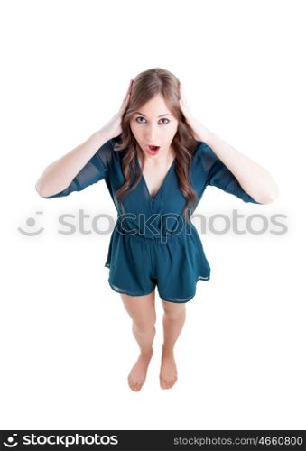 Surprised girl seen from above isolated on a white background