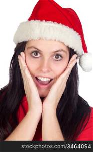 Surprised girl with Christmas hat isolated on a over white background