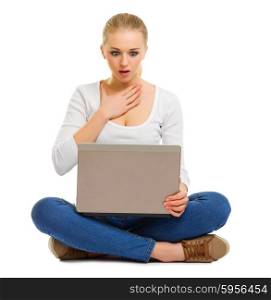 Surprised girl with laptop isolated
