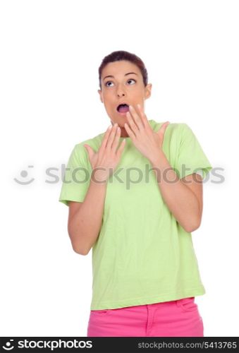 Surprised girl with pink jeans isolated on a white background