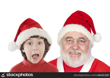 Surprised little boy and Santa Claus isolated on a white background
