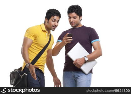 Surprised man looking at friend&rsquo;s cell phone