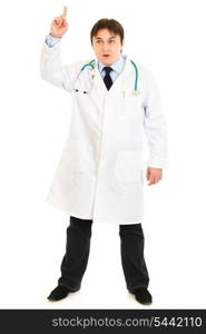 Surprised medical doctor with rised finger isolated on white. Idea gesture&#xA;