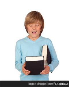 Surprised preteen boy with a book isolated on a white background