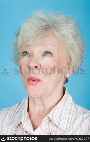 Surprised senior woman