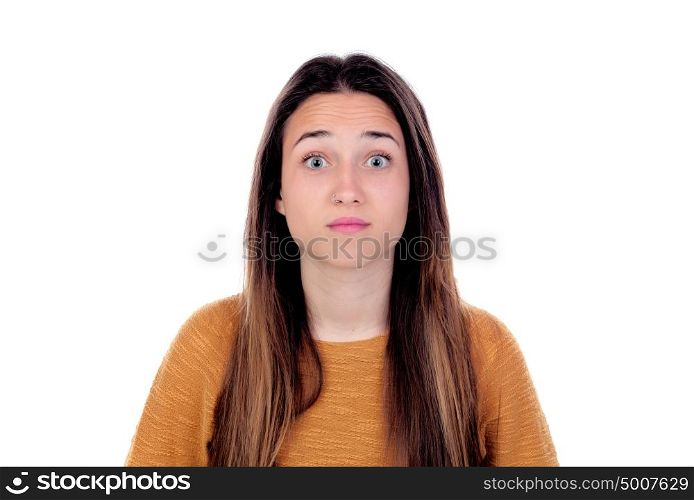 Surprised teenager girl with yellow jersey isolated on a white background