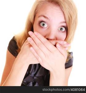 surprised woman afraid buisnesswoman in black dress covers mouth with hand isolated on white