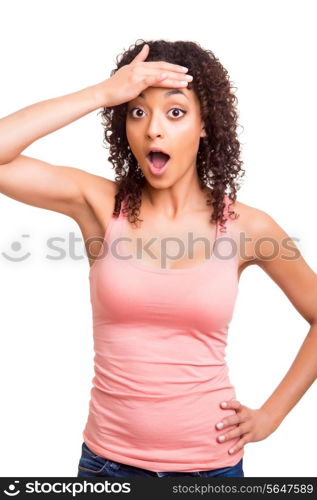 surprised young african woman over white background