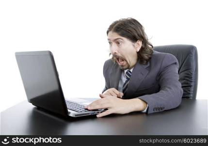 surprised young businessman working with is laptop
